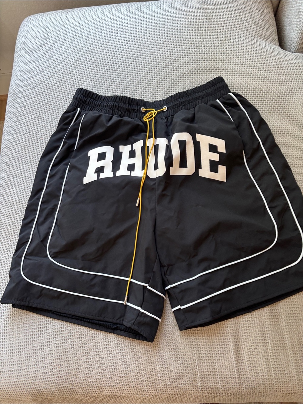 RHUDE Black Shorts with White Piping and Yellow Drawstring